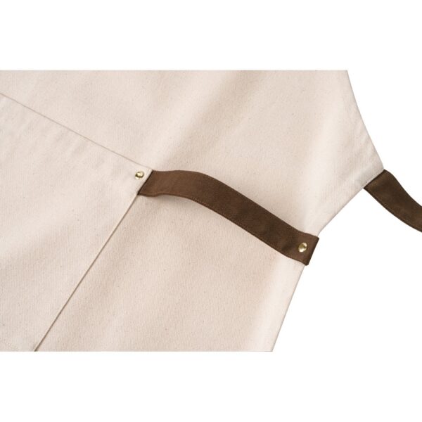 HOLM. 100% cotton canvas apron (320 g/m²) with metal details